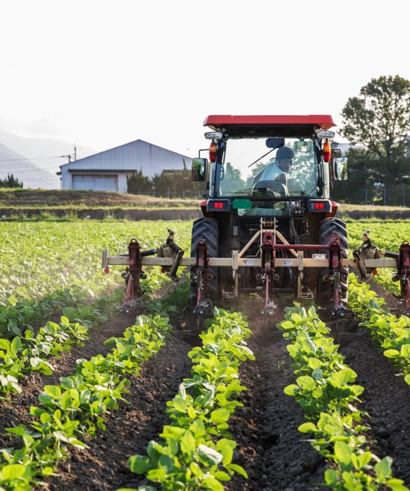 japanese-farmer-driving-red-tractor-through-a-fiel-2026-01-09-10-15-50-utc (1)
